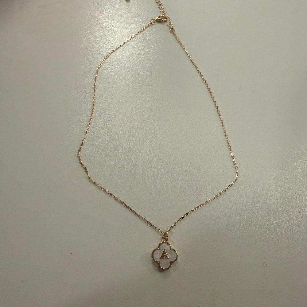Elegant Gold and White Pendant Necklace with the letter “A”